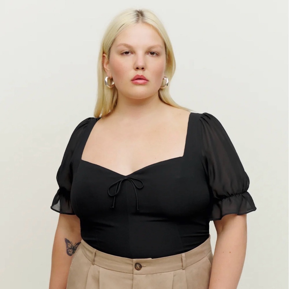 Reformation Delevan Top Es in the color Black, size 22.